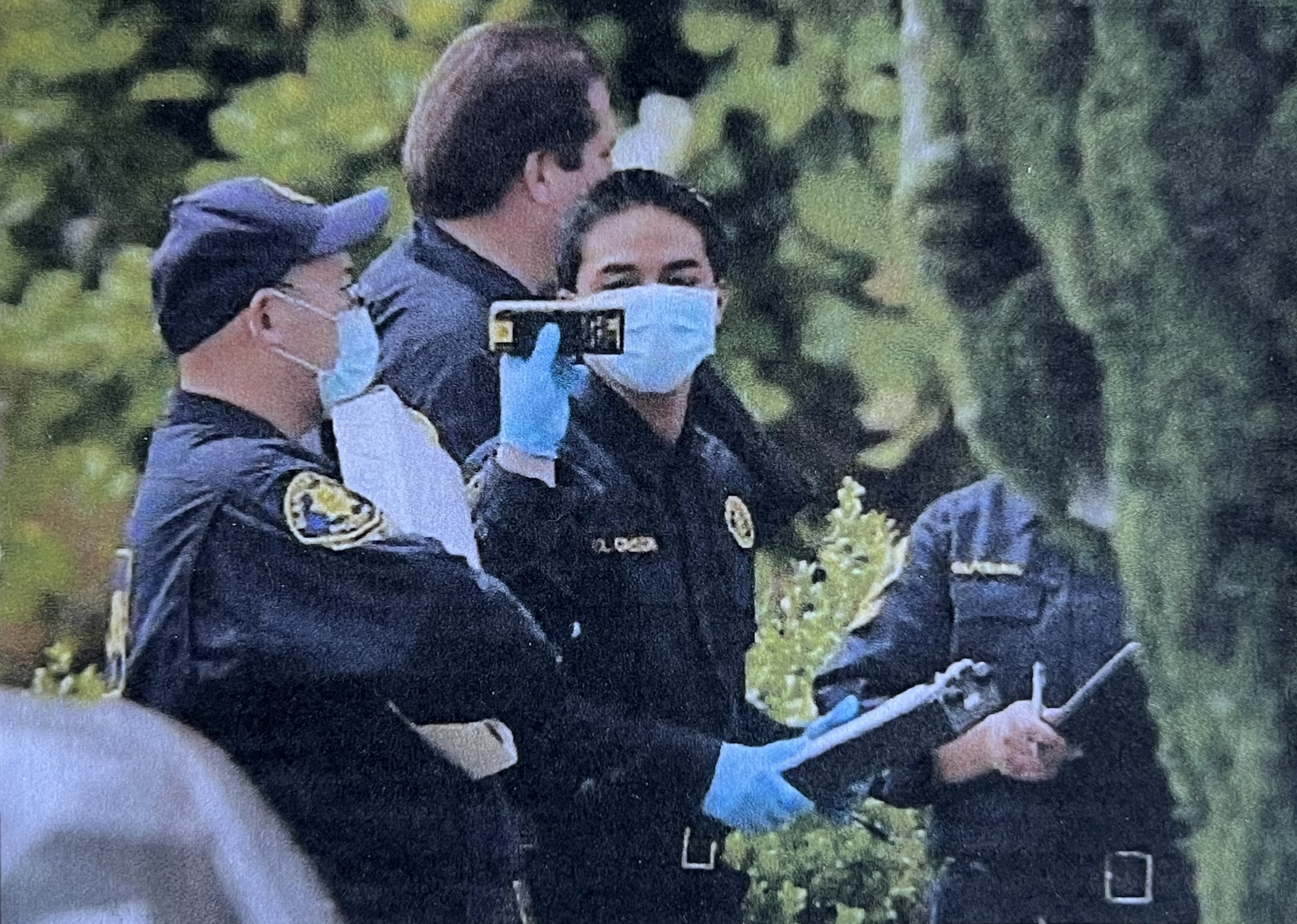 Guillermo looking at a laser measuring device